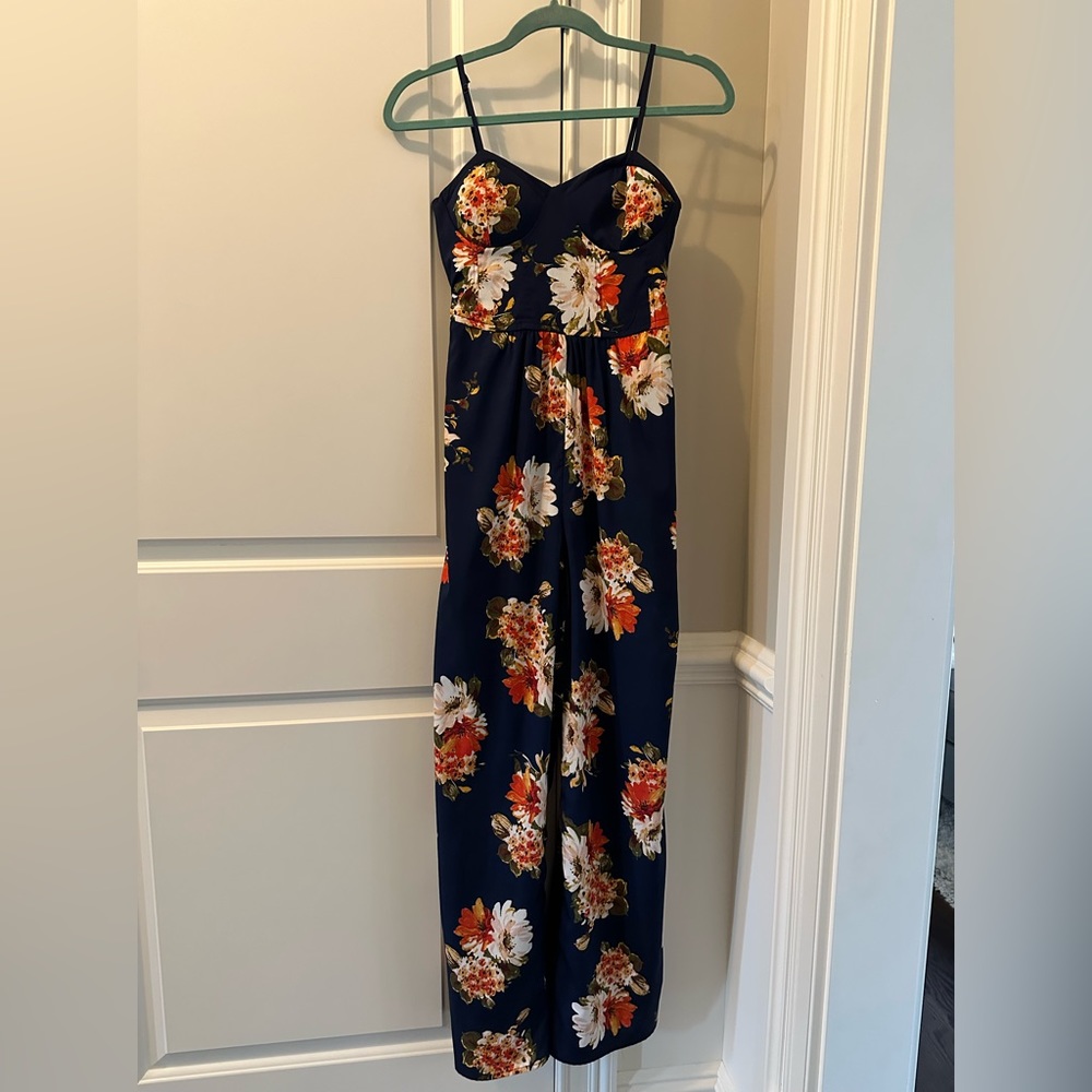 Gorgeous Floral Jumpsuit. Worn Once. Corset style top, wide leg bottom.
